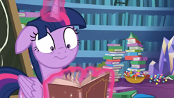 Size: 1920x1080 | Tagged: safe, derpibooru import, screencap, twilight sparkle, twilight sparkle (alicorn), alicorn, pony, best gift ever, book, bookshelf, candy, candy cane, ears, faic, female, flipping pages, floppy ears, food, levitation, magic, mare, pile of books, solo, telekinesis, twilight's castle, twilynanas