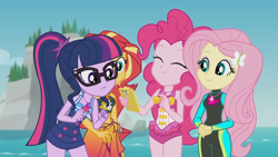 Size: 1920x1080 | Tagged: safe, derpibooru import, screencap, fluttershy, pinkie pie, sci-twi, sunset shimmer, twilight sparkle, better together, equestria girls, unsolved selfie mysteries, bare shoulders, belly button, bikini, bikini top, cellphone, clothes, eyes closed, female, fluttershy's wetsuit, geode of empathy, geode of fauna, geode of sugar bombs, geode of telekinesis, glasses, hairpin, legs together, magical geodes, one-piece swimsuit, phone, pinkie pie swimsuit, ponytail, sarong, sci-twi swimsuit, sleeveless, smartphone, swimsuit, water, wetsuit