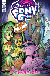 Size: 2063x3131 | Tagged: safe, derpibooru import, idw, apple bloom, queen chrysalis, scootaloo, sweetie belle, twilight sparkle, twilight sparkle (alicorn), alicorn, changeling, changeling queen, earth pony, pegasus, unicorn, anniversary, book, candle, cave, comic cover, cutie mark crusaders, facehoof, female, happy, official comic, smiling, speech bubble