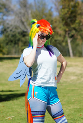 Size: 1019x1500 | Tagged: safe, derpibooru import, rainbow dash, human, clothes, cosplay, costume, irl, irl human, multicolored hair, photo, rainbow hair, solo, sunglasses