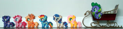 Size: 3340x800 | Tagged: safe, artist:kuren247, derpibooru import, applejack, fluttershy, pinkie pie, rainbow dash, rarity, spike, twilight sparkle, alicorn, earth pony, pegasus, pony, unicorn, christmas, holiday, irl, mane seven, mane six, merry christmas, miniature, perler beads, photo, photography, sleigh