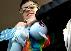 Size: 718x516 | Tagged: safe, screencap, rainbow dash, human, pegasus, pony, build-a-bear, destroyed, irl, irl human, photo, plushie, pony plushie, rainbow dash plushie, solo, toy abuse