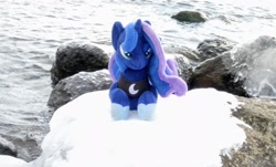 Size: 2048x1240 | Tagged: safe, derpibooru import, photographer:pakapaka1993, princess luna, alicorn, pony, seapony (g4), irl, japan, photo, plushie, race swap, rock, snow, solo, water, winter