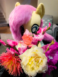 Size: 1725x2300 | Tagged: safe, artist:fluttershyhiker, derpibooru import, fluttershy, pony, flower, irl, photo, plushie, solo