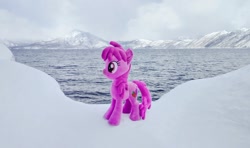 Size: 1024x605 | Tagged: safe, derpibooru import, photographer:pakapaka1993, berry punch, berryshine, earth pony, pony, irl, japan, mountain, ocean, photo, plushie, snow, solo, water, winter