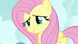 Size: 1280x720 | Tagged: safe, derpibooru import, screencap, fluttershy, pegasus, pony, it ain't easy being breezies, season 4, female, folded wings, mare, smiling, solo, wings