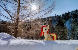 Size: 2048x1328 | Tagged: safe, derpibooru import, photographer:pakapaka1993, oc, oc only, oc:poniko, earth pony, pony, earth pony oc, irl, japan, photo, plushie, snow, solo, sunflare, sunlight, tree, winter