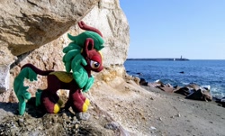 Size: 2048x1237 | Tagged: safe, derpibooru import, photographer:pakapaka1993, cinder glow, summer flare, kirin, pony, irl, japan, ocean, photo, plushie, rock, solo, water