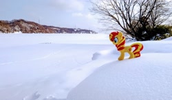 Size: 2048x1193 | Tagged: safe, derpibooru import, photographer:pakapaka1993, sunset shimmer, pony, unicorn, irl, japan, lake, photo, plushie, snow, solo