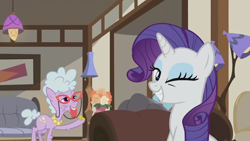 Size: 1920x1080 | Tagged: safe, derpibooru import, screencap, chelsea porcelain, rarity, earth pony, pony, unicorn, it isn't the mane thing about you, season 7, bits, female, grin, hoof hold, horn, indoors, mare, mouth hold, one eye closed, smiling, wink