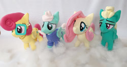 Size: 1024x546 | Tagged: safe, artist:fleecefriendship, derpibooru import, fluttershy, gentle breeze, posey shy, zephyr breeze, fluttershy's parents, photo, plushie, the shy family