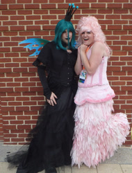 Size: 1969x2592 | Tagged: safe, artist:flufflepam, derpibooru import, queen chrysalis, oc, oc:fluffle puff, human, brick wall, changeling wings, clothes, cosplay, costume, dress, duo, insect wings, irl, irl human, photo, queen chrysalis' crown, wings