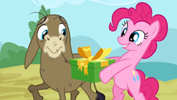 Size: 1280x720 | Tagged: safe, derpibooru import, screencap, cranky doodle donkey, pinkie pie, donkey, earth pony, pony, a friend in deed, bipedal, duo, female, male, mare, present
