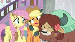 Size: 1280x720 | Tagged: safe, derpibooru import, screencap, applejack, fluttershy, yona, earth pony, pegasus, pony, yak, a matter of principals, ^^, applejack's hat, bowtie, clothes, cloven hooves, cowboy hat, cute, dirty, eyes closed, female, hat, horns, hug, monkey swings, mud, trio, trio female, yonadorable