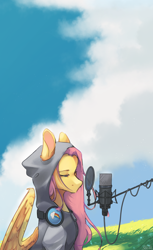 Size: 1280x2093 | Tagged: safe, artist:rladsenpai, derpibooru import, fluttershy, pegasus, pony, clothes, cloud, female, grass, grass field, headphones, hoodie, lidded eyes, looking at something, mare, microphone, outdoors, partially open wings, pop filter, rainbow dash's cutie mark, sitting, sky, solo, three quarter view, vertical, wings