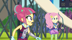 Size: 3410x1920 | Tagged: safe, derpibooru import, screencap, fluttershy, sour sweet, equestria girls, friendship games, archery, duo, duo female, eyeshadow, female, grin, hairpin, high res, makeup, sleeveless, smiling