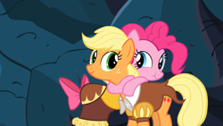 Size: 1280x720 | Tagged: safe, artist:dtkraus, derpibooru import, edit, screencap, applejack, chancellor puddinghead, pinkie pie, smart cookie, earth pony, pony, hearth's warming eve (episode), bowtie, cute, diapinkes, duo, duo female, eating, female, hearth's warming eve, hug, jackabetes, mare, nom, scrunchy face