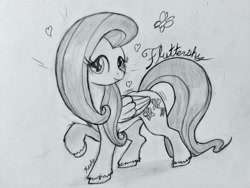 Size: 4160x3120 | Tagged: safe, artist:reekosukanku, derpibooru import, fluttershy, pegasus, pony, cursive writing, cute, daaaaaaaaaaaw, full body, heart, high res, looking at you, monochrome, pencil drawing, photo, raised hoof, raised leg, simple background, smiling, smiling at you, solo, traditional art