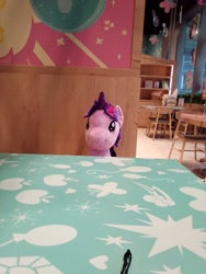 Size: 1200x1600 | Tagged: safe, derpibooru import, twilight sparkle, twilight sparkle (alicorn), alicorn, pony, my little pony: pony life, cafe, cutie mark, kumoya, looking at you, plushie, singapore, table