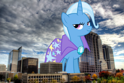 Size: 2048x1365 | Tagged: safe, artist:jeatz-axl, artist:thegiantponyfan, derpibooru import, trixie, pony, unicorn, brooch, california, cape, clothes, female, giant pony, giant unicorn, giantess, highrise ponies, irl, jewelry, looking at you, macro, mare, mega giant, mega trixie, photo, ponies in real life, sacramento, smiling, smiling at you, trixie's brooch, trixie's cape