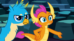 Size: 1920x1080 | Tagged: safe, derpibooru import, screencap, gallus, smolder, dragon, griffon, uprooted, dragoness, duo, female, gallus is not amused, hand on hip, male, smolder is not amused, unamused