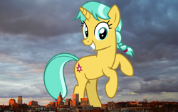 Size: 2268x1434 | Tagged: safe, artist:cheezedoodle96, artist:thegiantponyfan, derpibooru import, edit, citrine spark, fire quacker, pony, unicorn, bipedal, female, friendship student, giant pony, giant unicorn, giantess, grin, highrise ponies, irl, leaning, looking at you, macro, mare, mega giant, photo, ponies in real life, providence, rhode island, smiling, story included