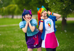 Size: 1280x884 | Tagged: safe, artist:krutaiamaria, artist:seabeersky, derpibooru import, rainbow dash, twilight sparkle, human, equestria girls, bubble, clothes, cosplay, costume, duo, irl, irl human, multicolored hair, photo, rainbow hair