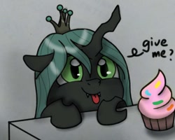 Size: 958x768 | Tagged: safe, artist:twiliset, derpibooru import, queen chrysalis, changeling, changeling queen, cupcake, cute, cute little fangs, excited, fangs, female, food, happy, hopping, looking at you, simple background, table, tongue, tongue out