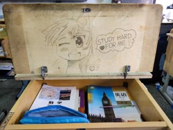 Size: 4000x3000 | Tagged: safe, artist:毛存伟岸, derpibooru import, derpy hooves, pegasus, pony, chinese, desk, irl, one eye closed, photo, solo, traditional art, wings, wink