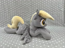 Size: 4032x3024 | Tagged: safe, artist:kazzysart, derpibooru import, derpy hooves, pony, irl, lying down, photo, plushie, prone, solo