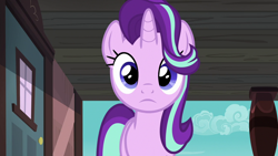 Size: 1280x720 | Tagged: safe, derpibooru import, screencap, starlight glimmer, pony, unicorn, uncommon bond, female, frown, looking at you, low angle, mare, solo, train station