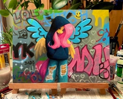 Size: 2048x1639 | Tagged: safe, artist:katputze, derpibooru import, fluttershy, anthro, pegasus, clothes, denim, female, graffiti, hand in pocket, hoodie, jeans, mare, pants, photo, ripped jeans, ripped pants, ripping clothes, solo, torn clothes, traditional art