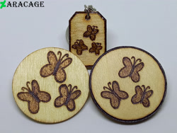 Size: 4000x3000 | Tagged: safe, artist:aracage, derpibooru import, fluttershy, badge, cutie mark, irl, keychain, no pony, photo, pyrography, traditional art