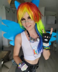 Size: 1080x1352 | Tagged: safe, artist:mayamystic, derpibooru import, rainbow dash, human, bare shoulders, clothes, cosplay, costume, devil horn (gesture), irl, irl human, multicolored hair, photo, rainbow hair, sleeveless, solo, tanktop