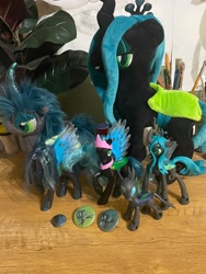 Size: 3024x4032 | Tagged: safe, derpibooru import, queen chrysalis, changeling, changeling queen, button, collection, female, figure, idk have fun, merchandise, photo, plushie