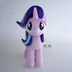 Size: 1500x1500 | Tagged: safe, artist:meplushyou, derpibooru import, starlight glimmer, pony, unicorn, cute, female, gray background, irl, looking at you, mare, photo, plushie, simple background, smiling, smiling at you, solo, watermark