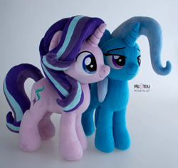 Size: 1600x1508 | Tagged: safe, artist:meplushyou, derpibooru import, starlight glimmer, trixie, pony, unicorn, duo, female, gray background, irl, mare, photo, plushie, simple background, smiling