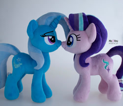 Size: 1500x1292 | Tagged: safe, artist:meplushyou, derpibooru import, starlight glimmer, trixie, pony, unicorn, boop, duo, female, gray background, irl, looking at each other, looking at someone, mare, noseboop, photo, plushie, simple background, smiling