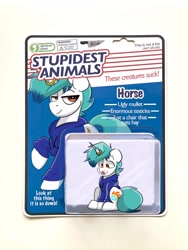 Size: 1154x1536 | Tagged: safe, artist:allicoot, derpibooru import, oc, oc only, pony, unicorn, clothes, hoodie, horn, horn ring, lidded eyes, looking at you, obvious plant, photoshop, ring, smiling, solo, tongue, tongue out, toy
