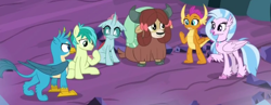 Size: 1448x560 | Tagged: safe, derpibooru import, screencap, gallus, ocellus, sandbar, silverstream, smolder, yona, changedling, changeling, classical hippogriff, dragon, earth pony, griffon, hippogriff, pony, yak, season 9, uprooted, spoiler:s09, bow, cloven hooves, colored hooves, cropped, dragoness, female, hair bow, jewelry, male, monkey swings, necklace, student six, teenager