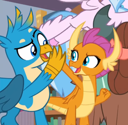 Size: 464x453 | Tagged: safe, derpibooru import, screencap, gallus, silverstream, smolder, yona, classical hippogriff, dragon, griffon, hippogriff, yak, what lies beneath, cropped, high five, offscreen character