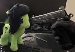 Size: 1170x810 | Tagged: safe, ponerpics import, oc, oc:anon filly, clothes, computer, cooler, female, filly, fnx-45, foal, gloves, gun, hand, irl, keyboard, monitor, photo, plushie, weapon