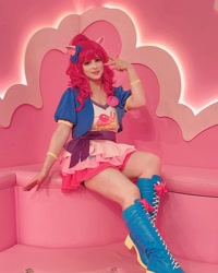 Size: 1080x1350 | Tagged: safe, derpibooru import, pinkie pie, human, clothes, cosplay, costume, irl, irl human, kotobukiya, kotobukiya pinkie pie, photo, sitting, solo