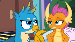 Size: 1044x587 | Tagged: safe, derpibooru import, screencap, gallus, silverstream, smolder, classical hippogriff, dragon, griffon, hippogriff, what lies beneath, book, dragoness, female, male, talons