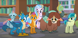 Size: 1502x738 | Tagged: safe, derpibooru import, screencap, gallus, ocellus, sandbar, silverstream, smolder, yona, changedling, changeling, classical hippogriff, dragon, earth pony, griffon, hippogriff, pony, yak, what lies beneath, bookshelf, bow, cloven hooves, cropped, dragoness, female, globe, hair bow, jewelry, monkey swings, necklace, offscreen character, student six