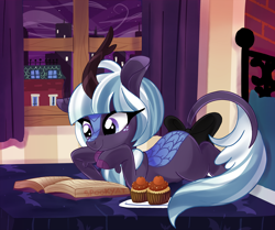 Size: 2596x2169 | Tagged: safe, artist:spookyle, derpibooru import, oc, oc only, oc:moonlit breeze, kirin, bed, book, bow, city, cupcake, female, food, lying down, night, prone, solo, tail, tail bow, window