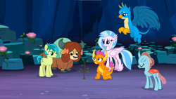 Size: 1600x900 | Tagged: safe, derpibooru import, screencap, gallus, ocellus, sandbar, silverstream, smolder, yona, changedling, changeling, classical hippogriff, dragon, earth pony, griffon, hippogriff, pony, yak, uprooted, bow, cloven hooves, colored hooves, eyes closed, hair bow, jewelry, kneeling, monkey swings, necklace, raised eyebrow, student six