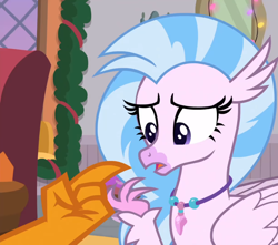 Size: 1020x900 | Tagged: safe, derpibooru import, screencap, silverstream, smolder, classical hippogriff, dragon, hippogriff, the hearth's warming club, cropped, dragoness, female, jewelry, necklace, offscreen character, pointing, solo focus
