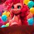 Size: 1024x1024 | Tagged: safe, derpibooru import, generator:purplesmart.ai, generator:stable diffusion, machine learning generated, pinkie pie, earth pony, pony, balloon, female, mare, party, smiling, solo, table