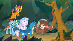 Size: 1600x898 | Tagged: safe, derpibooru import, screencap, gallus, ocellus, sandbar, silverstream, smolder, yona, changedling, changeling, classical hippogriff, dragon, earth pony, griffon, hippogriff, pony, yak, non-compete clause, cloven hooves, colored hooves, dragoness, female, forest, jewelry, male, mushroom, necklace, student six, tree